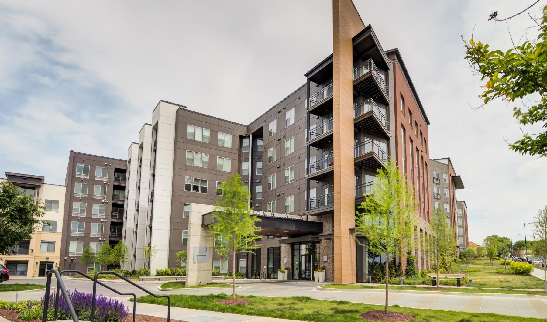 Find your perfect fit at Union Heights a building with a courtyard and trees