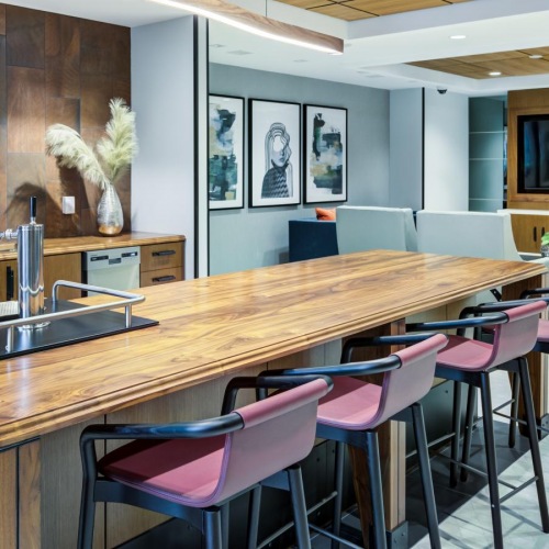 Take advantage of all Union Heights has to offer a kitchen with a bar and chairs