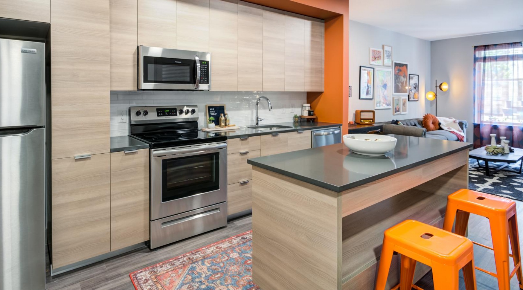 Find your perfect fit at Union Heights a kitchen with a bar and stools